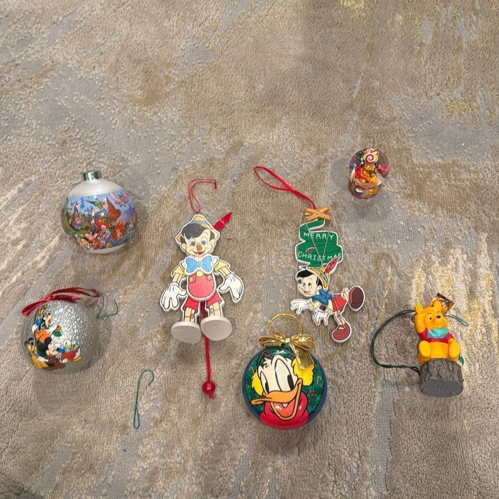 Lot of 7 Disney ornaments Pinocchio Winnie Donald magic kingdom